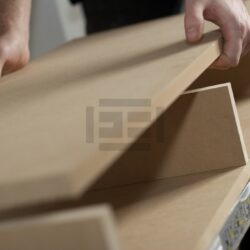 Carpenter Assembling Cabinet  In Workshop