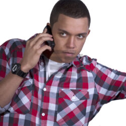Young Mixed Race Student On Mobile Phone