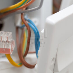 A new installation of a British 13 amp electrical socket being installed in a domestic house in the UK